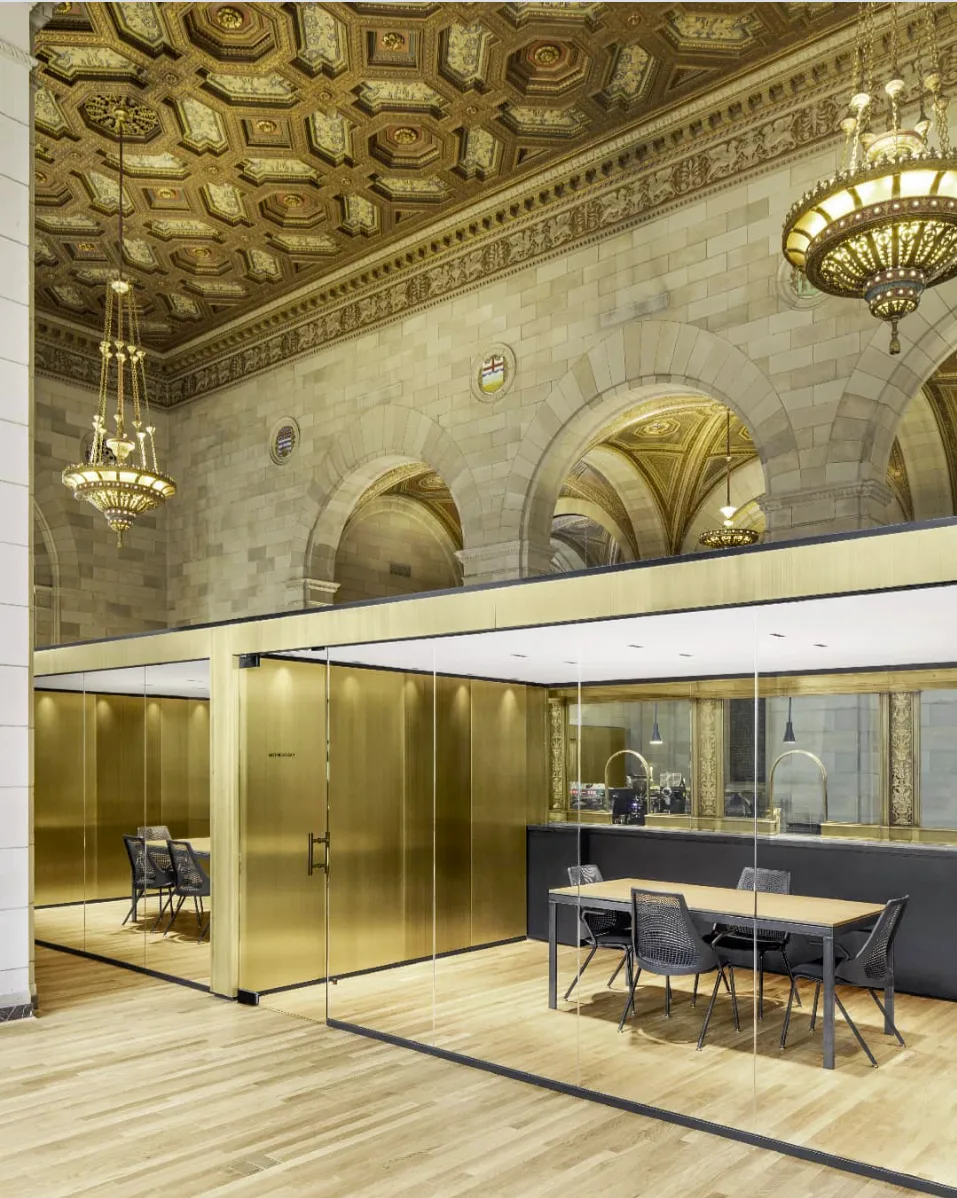 Private meeting rooms in brass and glass
