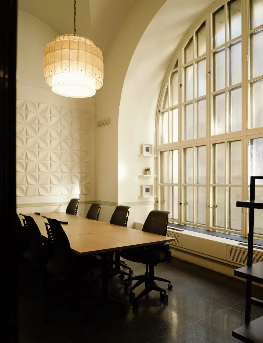Private meeting room with arched window