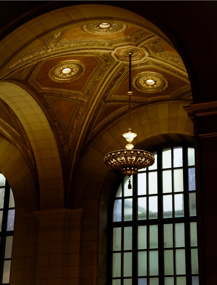 Vaulted ceiling and original brass lamp