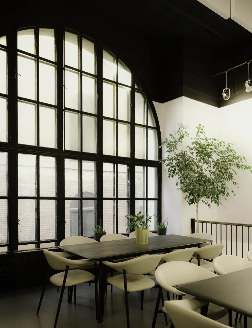 Dining room beneath the arched windows