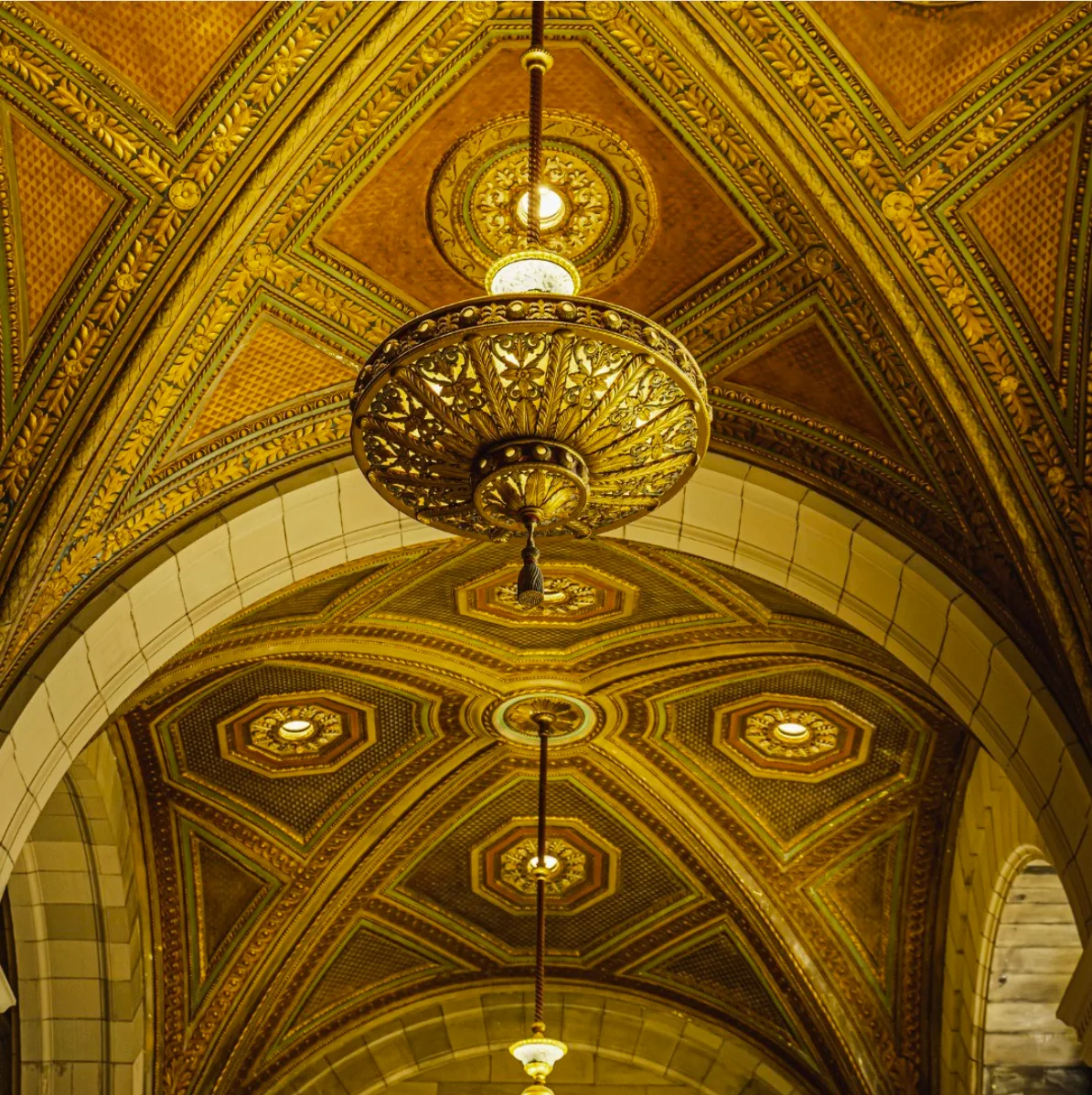 Coffered gilded ceiling and chandelier